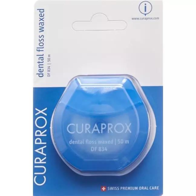Зубна нитка Curaprox DF 834 50м м'ятна вощена Зубна нитка Curaprox DF 834 50м м'ятна вощена